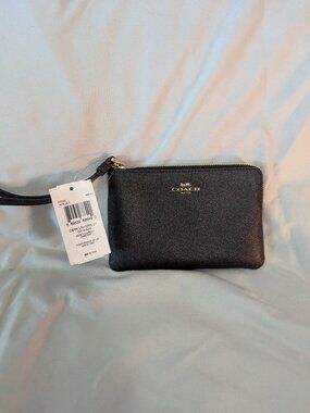 Black COACH wristlet